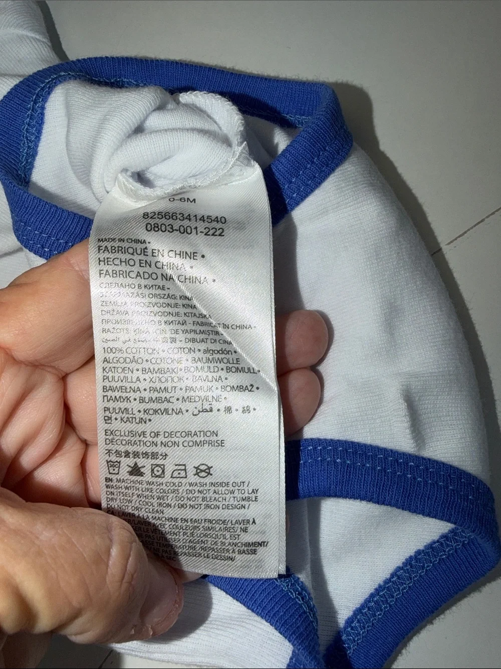 Baby Nike White One-Piece Bodysuit with Blue Trim & Neon Green Logo‎